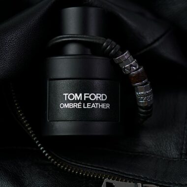 Tom Ford Ombré Leather fragrance bottle surrounded by luxurious black leather.
